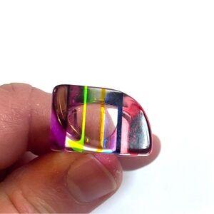 Vintage Lucite Ring of Colorful Stripes against Clear Acrylic.